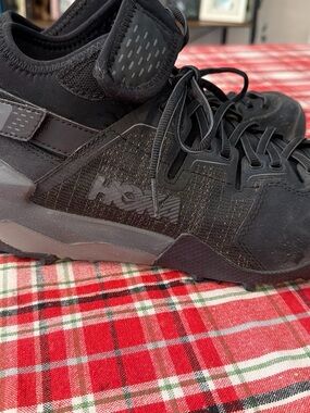 Hoka Black One One Sky Arkali hiking shoes featuring a durable Vibram Megagrip